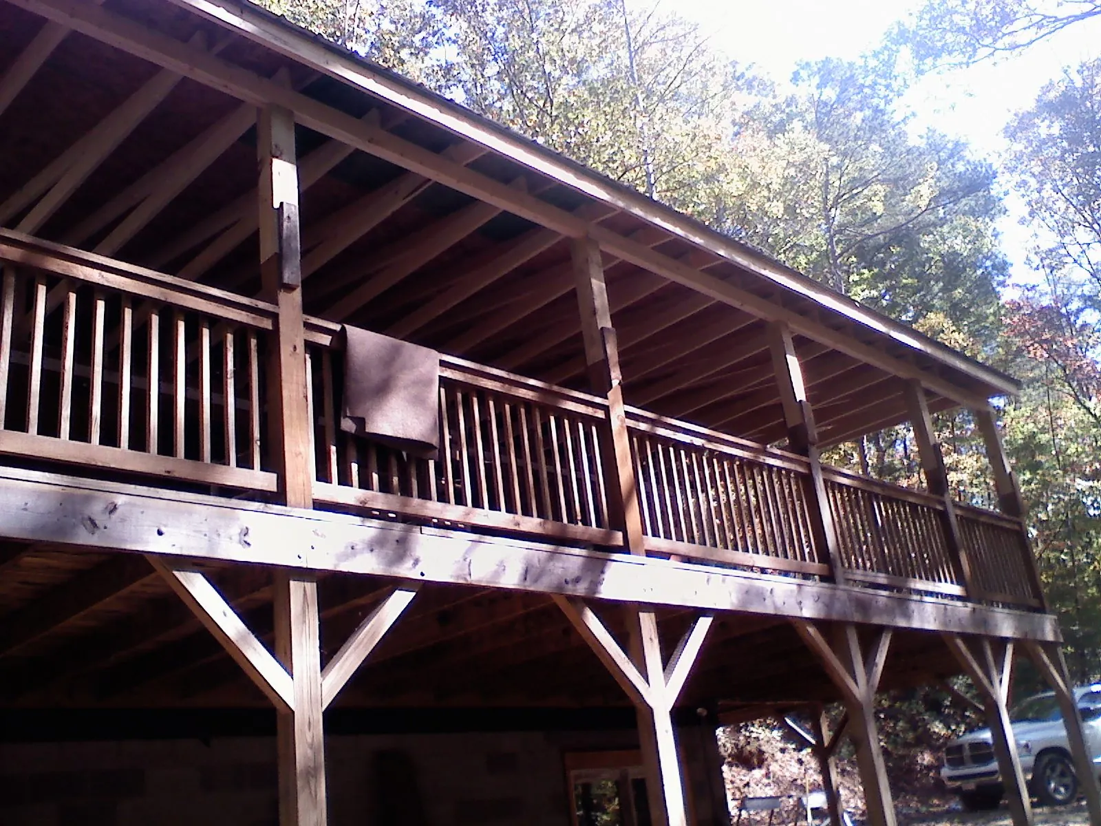 Timber framing under a new elevated porch and deck — Roof Leak Repair in North Aurora by Roofing Brothers